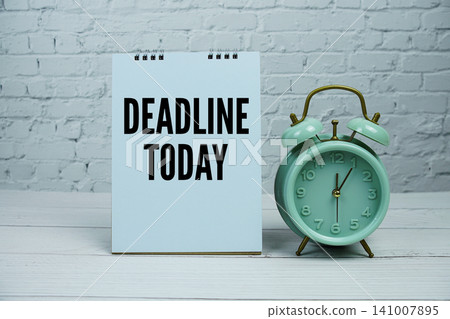 "Deadline Today" Reminder with Mint Green Alarm Clock on white brick wall Background "Deadline Today" Reminder with Mint Green Alarm Clock on white brick wall Background 141007895