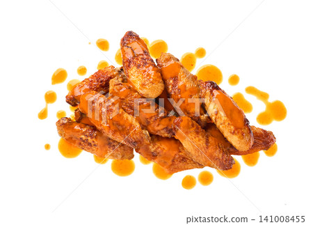 crunchy buffalo chicken wings with Cayenne pepper sauce isolated on white background, top view. Hot and spicy red Buffalo sauce for chicken wings crunchy buffalo chicken wings with Cayenne pepper sauce isolated on white background, top view. Hot and spicy red Buffalo sauce for chicken wings 141008455