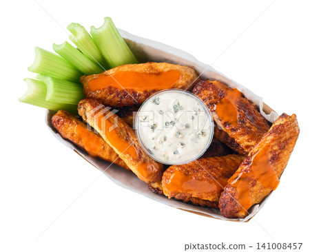 crunchy buffalo chicken wings with celery sticks and blue cheese dipping sauce in paper tray isolated on white background, top view. crunchy buffalo chicken wings with celery sticks and blue cheese dipping sauce in paper tray isolated on white background, top view. 141008457