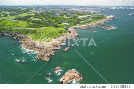 Aerial view of the Tanesashi Coast in Aomori Prefecture in early summer, at Ashigezaki. Aerial view of the Tanesashi Coast in Aomori Prefecture in early summer, at Ashigezaki. 141008881