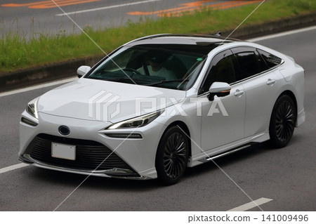 Image of a fuel cell vehicle in motion Image of a fuel cell vehicle in motion 141009496