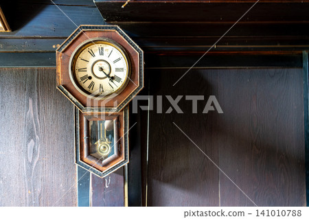 Old pendulum clock 141010788