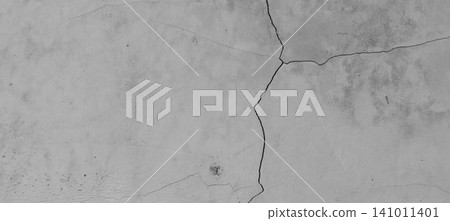 Cracked concrete wall with a minimalist gray cement texture. 141011401