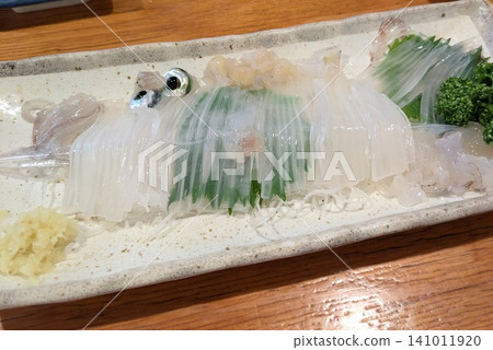 Hokkaido, Hakodate: Fresh, live squid sashimi Hokkaido, Hakodate: Fresh, live squid sashimi 141011920