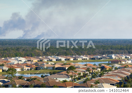Air contamination with burning smoke from prescribed fire close to suburban area in Florida, USA Air contamination with burning smoke from prescribed fire close to suburban area in Florida, USA 141012464