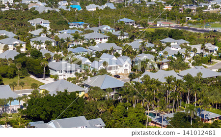 Boca Grande, Florida. View from above of large residential homes. American houses in rural US suburbs Boca Grande, Florida. View from above of large residential homes. American houses in rural US suburbs 141012481