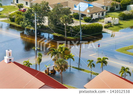Tropical rainstorm flooded residential homes in suburban community in Punta Gorda, Florida. Hurricane Milton aftermath Tropical rainstorm flooded residential homes in suburban community in Punta Gorda, Florida. Hurricane Milton aftermath 141012538