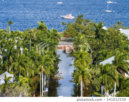 Flooding in Florida caused by tropical storm from hurricane Milton. Suburb houses in Punta Gorda residential community surrounded by flood waters. Aftermath of natural disaster Flooding in Florida caused by tropical storm from hurricane Milton. Suburb houses in Punta Gorda residential community surrounded by flood waters. Aftermath of natural disaster 141012539