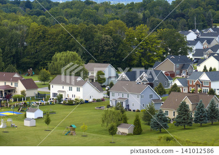 Housing market in the USA. Residential homes in suburban sprawl development in Rochester, New York. Low-density two story private houses in rural suburbs Housing market in the USA. Residential homes in suburban sprawl development in Rochester, New York. Low-density two story private houses in rural suburbs 141012586