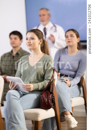 Students in medical courses listen to a lecture Students in medical courses listen to a lecture 141012706