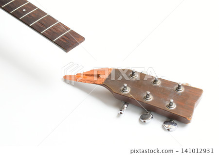 part of broken wood acoustic guitar isolated on white background part of broken wood acoustic guitar isolated on white background 141012931