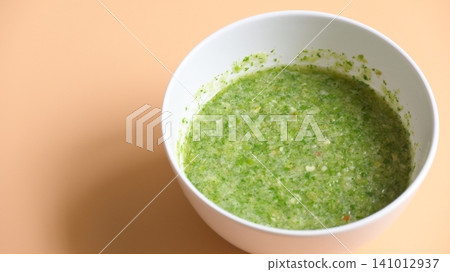 Thai spicy seafood dipping sauce on white bowl Thai spicy seafood dipping sauce on white bowl 141012937
