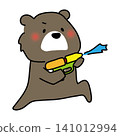 A bear playing with a water gun 141012994