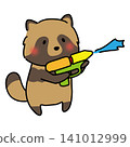 A raccoon playing with a water gun 141012999