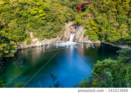 Springtime in Yakushima: Toroki Falls cascading into the sea Springtime in Yakushima: Toroki Falls cascading into the sea 141013809