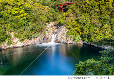 Springtime in Yakushima: Toroki Falls cascading into the sea Springtime in Yakushima: Toroki Falls cascading into the sea 141013810
