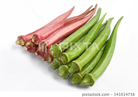 Long red and green okra purchased at a direct sales market. Long red and green okra purchased at a direct sales market. 141014738