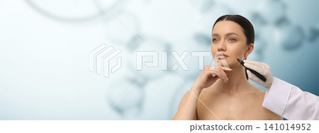 Professional performs skin treatment on a calm patient in clinic 141014952