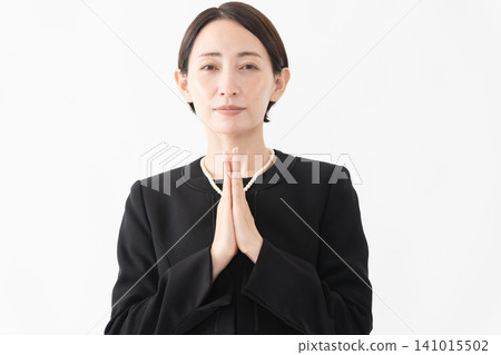 Woman in mourning clothes Funeral image Woman in mourning clothes Funeral image 141015502