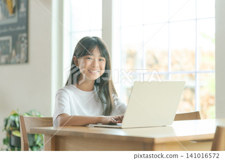 Girls taking online classes Girls taking online classes 141016572