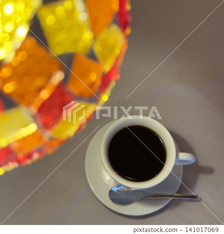 Mosaic lamp and coffee 141017069