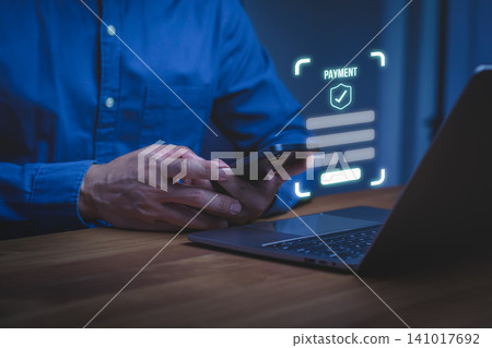 Man using smartphone for secure online digital payment. Mobile banking technology concept for business finance and internet transaction. Man using smartphone for secure online digital payment. Mobile banking technology concept for business finance and internet transaction. 141017692