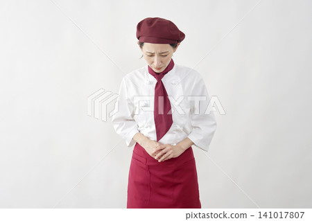 Female pastry chef/baker/cafe employee apologizes on a white background. 141017807