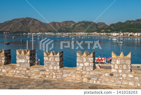 Medieval stone battlements overlooking sea bay in Marmaris Turkey Medieval stone battlements overlooking sea bay in Marmaris Turkey 141018203