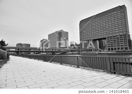 Sumida River Bridge under a cloudy sky, viewed from Sumida River Terrace (long exposure). Sumida River Bridge under a cloudy sky, viewed from Sumida River Terrace (long exposure). 141018403