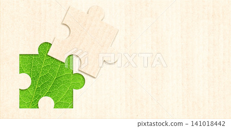 Horizontal banner with part of puzzle from recycled paper and green leaf. Development of strategy approach to zero waste, responsible consumption. Reuse, renewable resource, eco-friendly concept Horizontal banner with part of puzzle from recycled paper and green leaf. Development of strategy approach to zero waste, responsible consumption. Reuse, renewable resource, eco-friendly concept 141018442