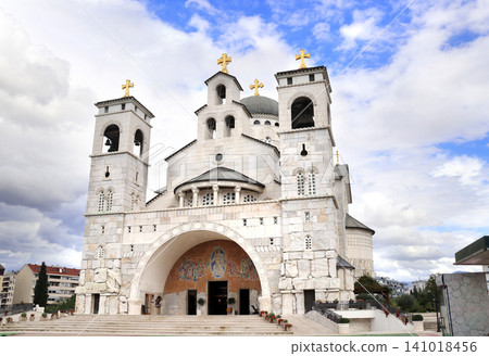 Famous landmark cathedral of Christ's Resurrection, Podgorica, Montenegro. Picturesque scene with Cathedral of Resurrection of Christ, New Town district of Podgorica. Topic of summer vacation, travel Famous landmark cathedral of Christ's Resurrection, Podgorica, Montenegro. Picturesque scene with Cathedral of Resurrection of Christ, New Town district of Podgorica. Topic of summer vacation, travel 141018456