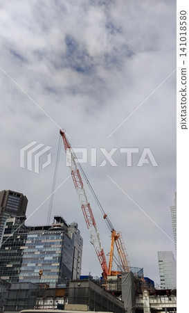 Urban landscape of Shibuya, Tokyo: Giant cranes underway during large-scale development. 141018580