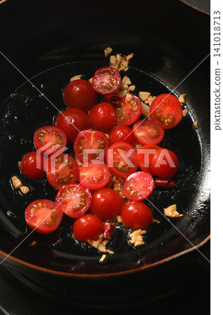 Cooking cherry tomatoes Cooking cherry tomatoes 141018713