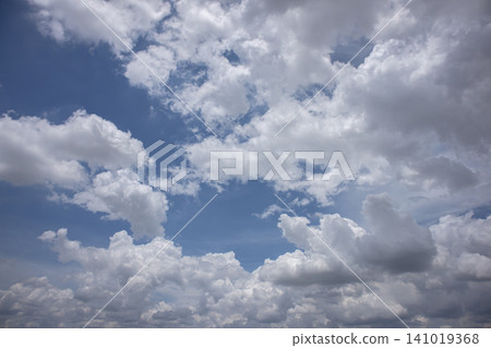 Blue sky with cloud cover and dramatic cumulus cloud formation Blue sky with cloud cover and dramatic cumulus cloud formation 141019368