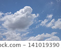 Blue sky with white cloud and soft daylight, peaceful summer weather scene 141019390