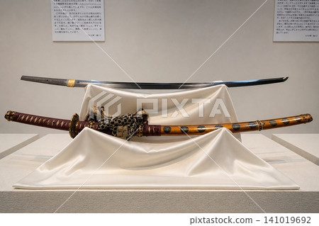 Japanese swords displayed in a museum Japanese swords displayed in a museum 141019692