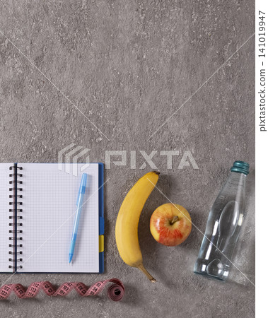 Healthy lifestyle planning smartphone notebook Healthy lifestyle planning smartphone notebook 141019947