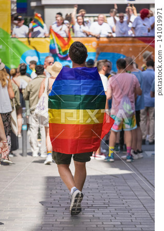 Participant draped rainbow flag Pride Participant draped rainbow flag Pride 141019971