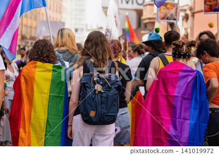 Participants wearing rainbow pride flags demonstration Participants wearing rainbow pride flags demonstration 141019972