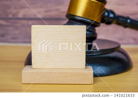 lack Wooden Gavel with Blank Square Sign Board for text on Wood Table Legal Concept lack Wooden Gavel with Blank Square Sign Board for text on Wood Table Legal Concept 141021633