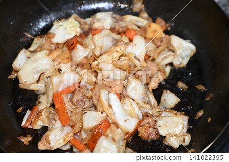 A fragrant stir-fry of cabbage, carrots, and chicken. 141022395