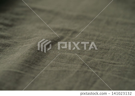 Closeup photo of cotton fabric for clothing Closeup photo of cotton fabric for clothing 141023132