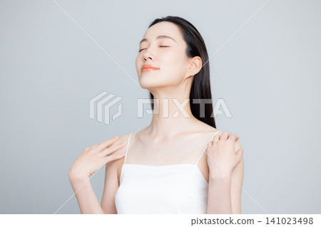 A woman with a beautiful neck A woman with a beautiful neck 141023498