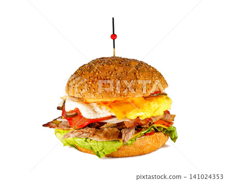 Classic cheeseburger with fresh lettuce and tomato isolated on a white background. Top view Classic cheeseburger with fresh lettuce and tomato isolated on a white background. Top view 141024353