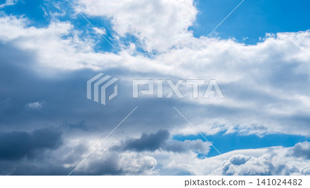 Many white clouds drift across the blue winter sky. Many white clouds drift across the blue winter sky. 141024482
