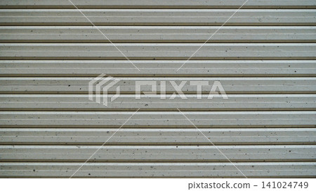 Full frame textured metal rolling shutter door texture Full frame textured metal rolling shutter door texture 141024749
