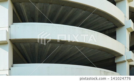 Spiral concrete ramp structure of a multi level parking garage Spiral concrete ramp structure of a multi level parking garage 141024776