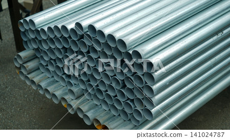 Stacked galvanized steel pipes background Stacked galvanized steel pipes background 141024787