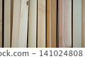 Vertical samples of natural pine lumber planks and timber boards 141024808