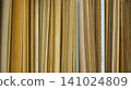 Vertical samples of thin wood veneer sheets and boards 141024809